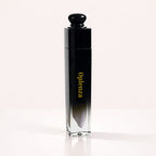 Oplenza Signature Ultra Shine Lip Gloss in 01 Opaline, showing the tube on a neutral background, best shimmer vegan tinted lip gloss