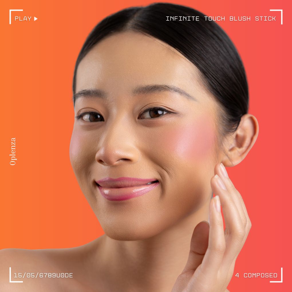 A woman wearing on her cheek Oplenza highly pigmented, bold color dewy Blush Stick in shade Composed