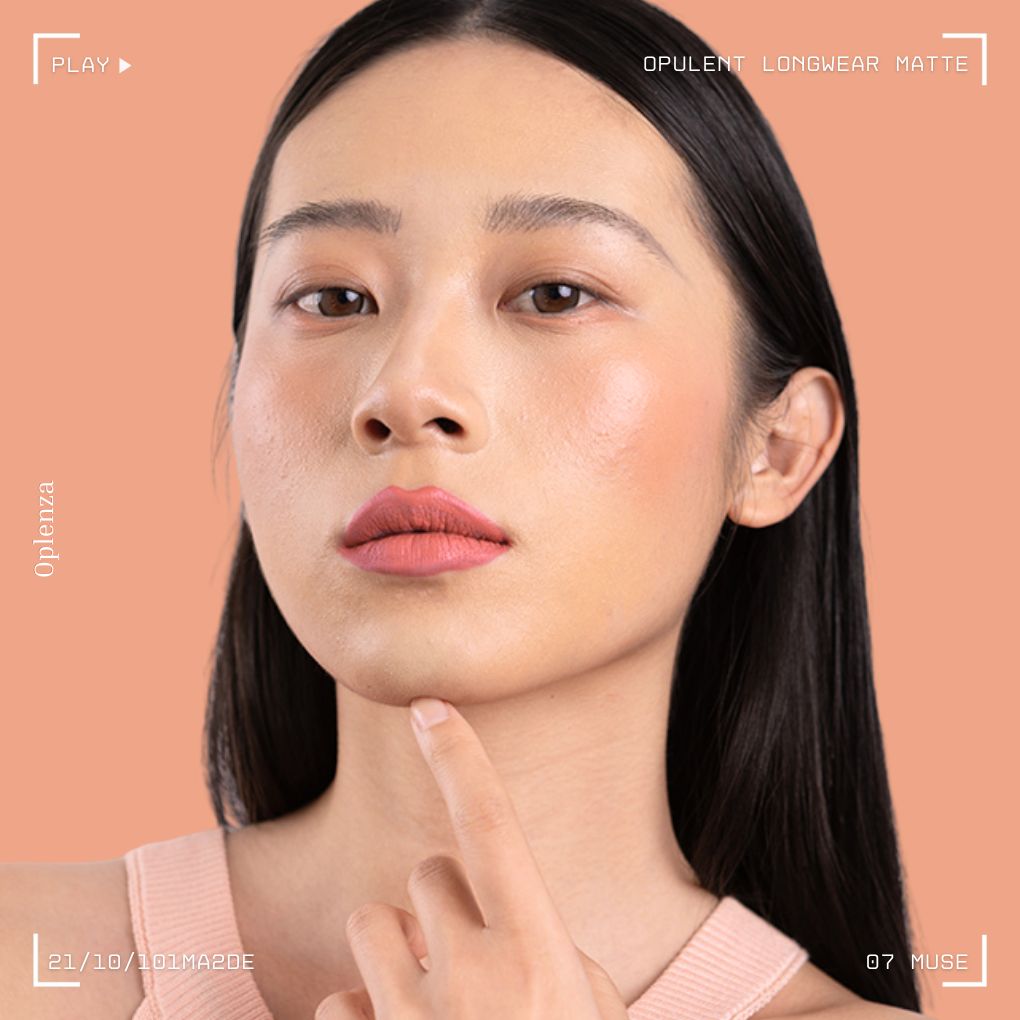 Woman wearing Oplenza Opulent Longwear Matte liquid lipstick in shade 07 Muse - Highly pigmented, waterproof vegan liquid matte with smooth velvety finish