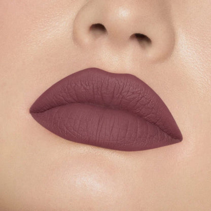 Close-up of model wearing oplenza Icon Matte Lipstick in shade 08 Wine Icon, best matte lipstick drugstore for fair skin.