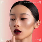 A woman showcasing and wearing on her cheek Oplenza infinite touch Blush Stick in shade 11 Mocha; Highly pigmented blush stick with blendable creamy texture