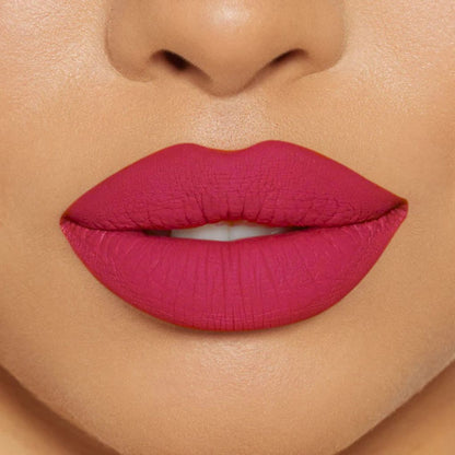 Close-up of model wearing oplenza Icon Matte Lipstick in shade 22 Rosy Icon, best matte lipstick for light brown Skin