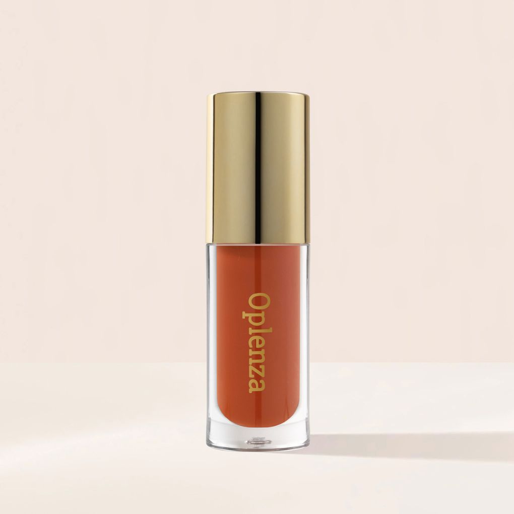 Oplenza Opulent Lustre Gloss - Amber, lightweight feel, soft matte look, long-lasting wear lip gloss for a flawless, radiant beauty look.
