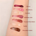 Oplenza Obsession Glass Lip Gloss full shade range.
Shades:  Cherry, Strawberry, Coconut, Birthday Cake, Caramel Macchiato, Vanilla, Chocolate cookie.