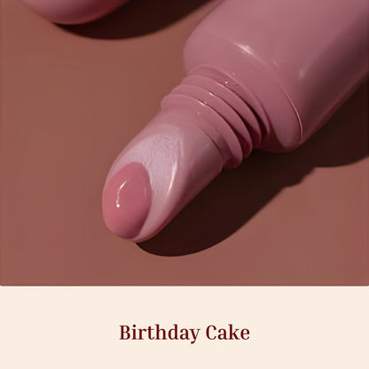 Oplenza Obsession Glass Lip Gloss applicator close-up, shade Birthday Cake