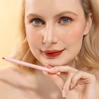 An elegant woman wearing and showcasing the vegan, luxury and cruelty free oplenza Define & Refine Lip Liner in the color Cocoa Rouge