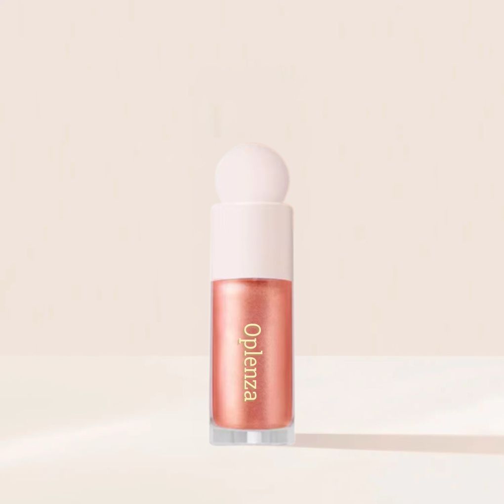 Oplenza Opulent Light Luminizer - Coralia, radiant skin, bold color, smudge-proof liquid highlither for a radiant beauty look.
