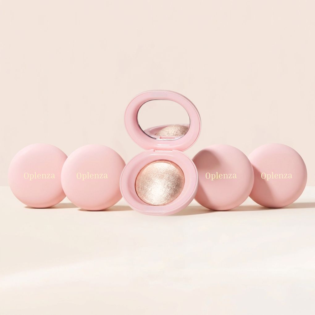 Oplenza Silky Touch Highlighters on a beige background-Glass-like pressed powder highlighter texture
Shades: Champagne, Pearl, Copper, Rose.