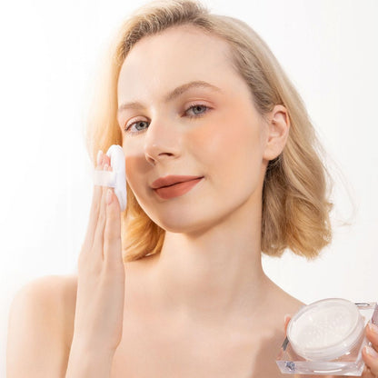 Woman showcasing Oplenza cruelty free matte radiant Natural Veil Setting Powder. Shades: Transluscent, Ivory, Sand, Butter, Kunafa, Honey, Caramel, Cacao, Rosé