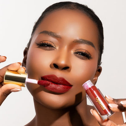 Model wearing and showcasing the vegan, cruelty-free Oplenza matte liquid lipstick in the shade Power