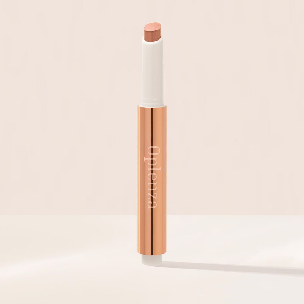 Oplenza Hydrating Shimmer Lip Balm in Praline, tinted moisturizing lip balm.