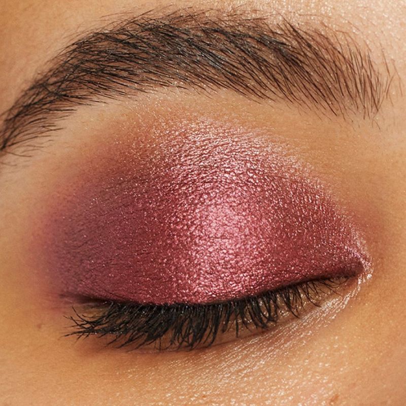 Woman showcasing Oplenza Easy Glide Eyeshadow Stick in shade Rose-best Eyeshadow stick highlighting inner corner of eyes, and use on Eyelid.