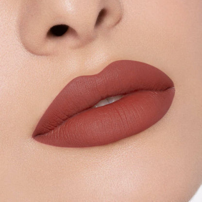 Close-up of a creamy, comfortable matte lipstick applied on lips in shade 02 Power Move