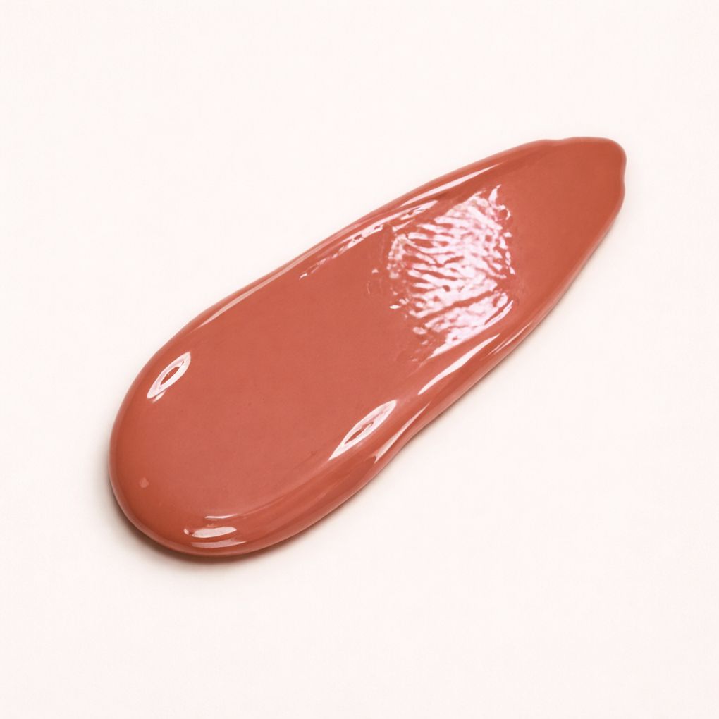 Swatch of Oplenza Signature Ultra Shine Lip Gloss in shade Skin - best non sticky lip gloss.