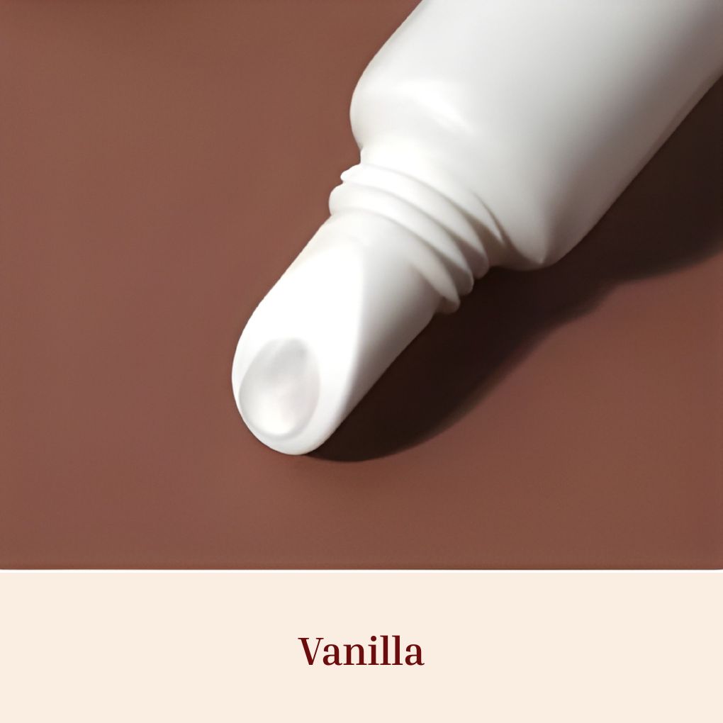 Oplenza Obsession Glass Lip Gloss applicator close-up, shade Vanilla