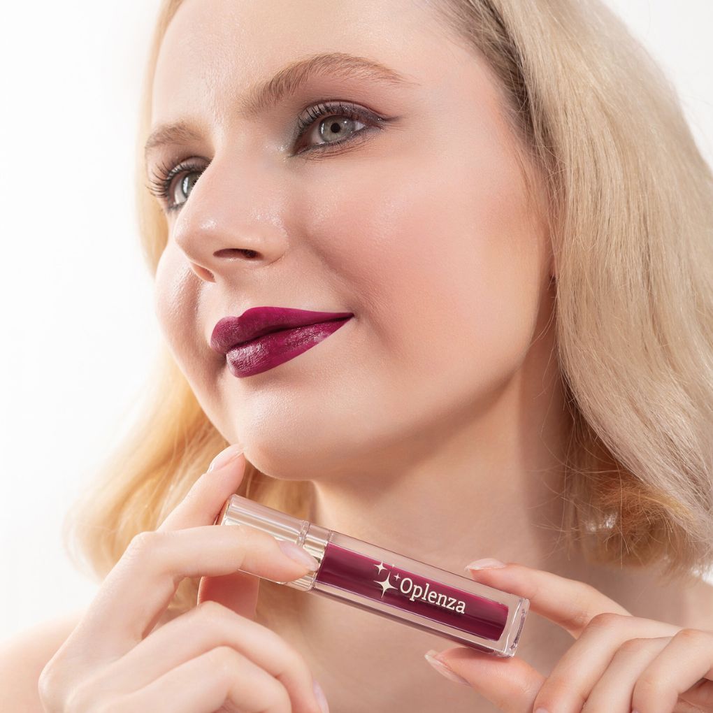 Woman with purple lipstick holding an Oplenza product, Violet Echo