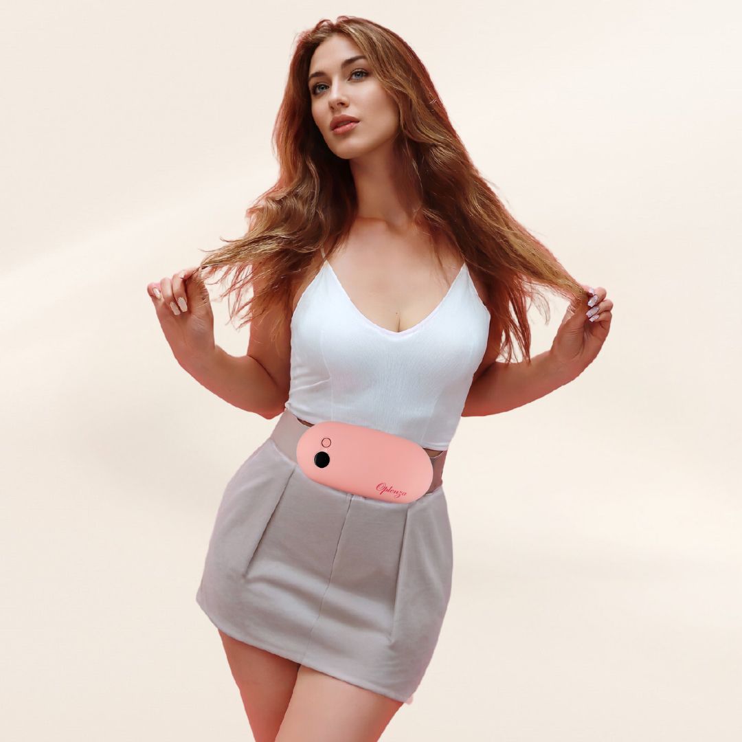 Model wearing on her waist the Oplenza period pain relief device - Soft Taupe, suitable for menstrual cramps relief
